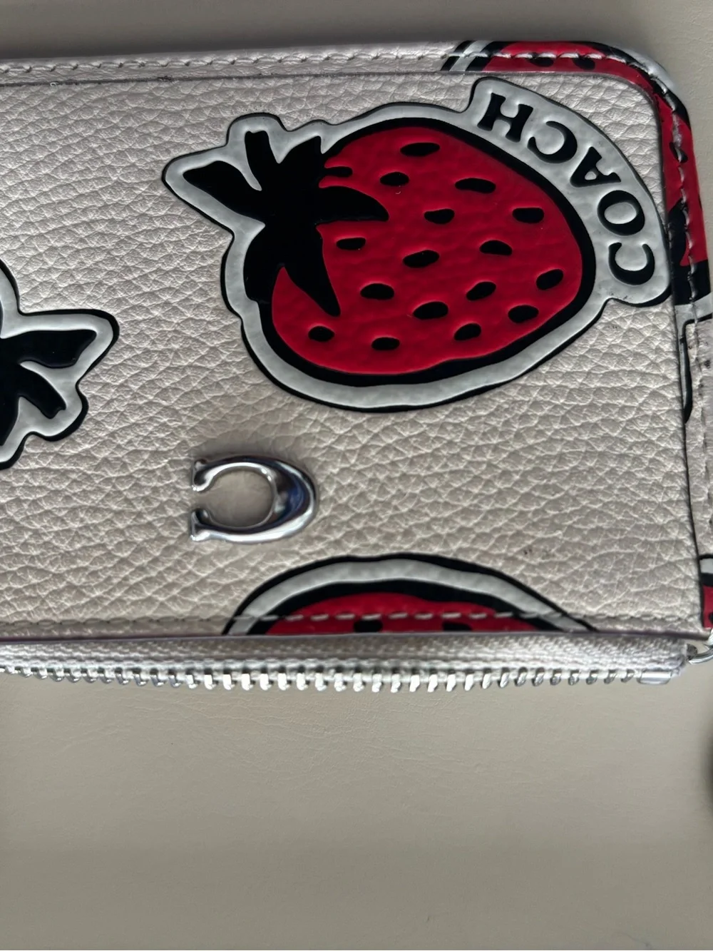 Coach Leather Pouch with Red Strawberry Keychain.